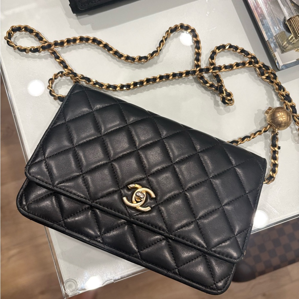 Chanel La Pearl caviar crossbodies “Microchipped”